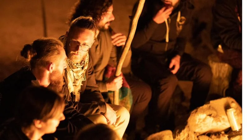People gathered around fire