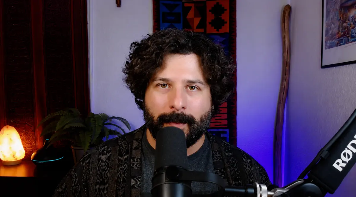 Mike Brancatelli recording at his podcast studio desk