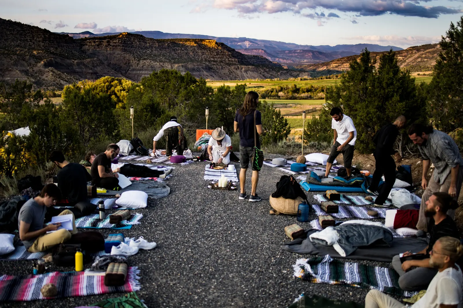 An evening retreat circle at golden hour in western Colorado
